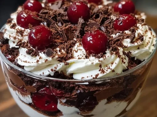 Delicious Black Forest Trifle with layers of chocolate, cream, and cherries for Christmas