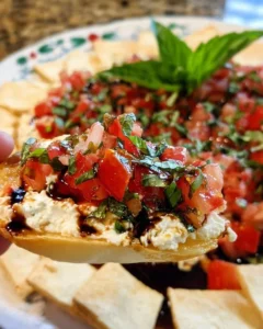 Delicious Bruschetta Dip served with crispy bread and fresh toppings