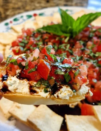 Delicious Bruschetta Dip served with crispy bread and fresh toppings