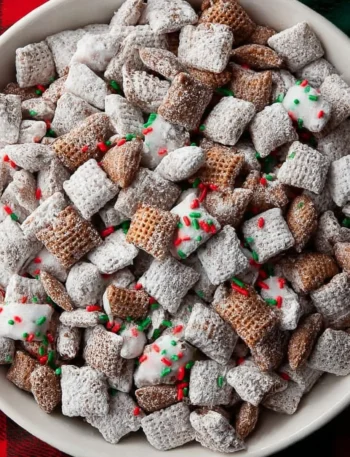 Delicious Christmas Puppy Chow with festive colors and toppings