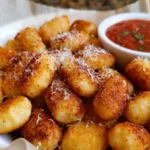 Crispy air fryer gnocchi served with herbs and spices