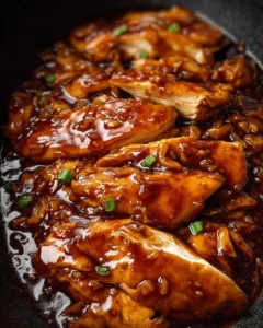Crockpot honey garlic chicken served with rice and vegetables