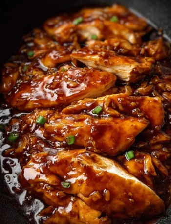 Crockpot honey garlic chicken served with rice and vegetables
