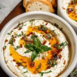 Delicious ricotta dip drizzled with hot honey served in a bowl
