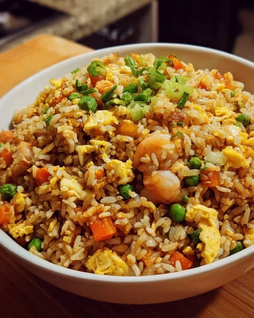 Delicious plate of easy Chinese fried rice with vegetables and eggs