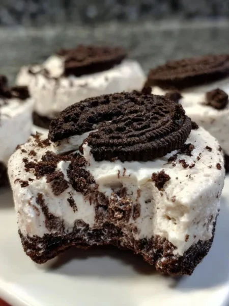 Healthy No-Bake Oreo Cheesecake Bites topped with crushed Oreos