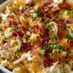 Delicious Crazy Good Casserole topped with melted cheese and herbs