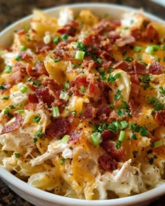 Delicious Crazy Good Casserole topped with melted cheese and herbs