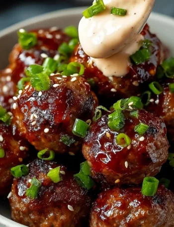 Korean BBQ Meatballs served with spicy mayo dip for a flavorful appetizer