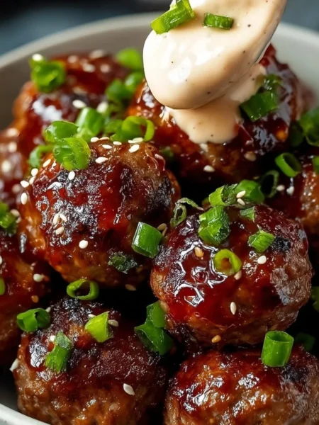 Korean BBQ Meatballs served with spicy mayo dip for a flavorful appetizer