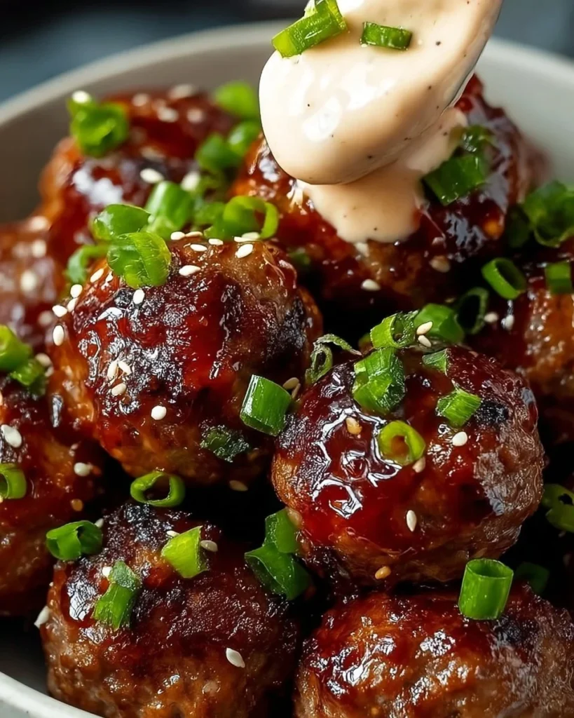 Korean BBQ Meatballs served with spicy mayo dip for a flavorful appetizer
