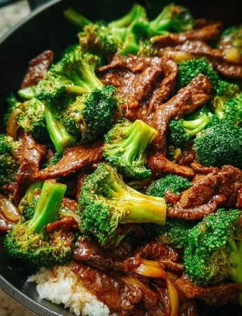 Delicious plate of Chinese Beef and Broccoli served with rice