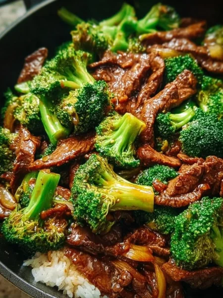 Delicious plate of Chinese Beef and Broccoli served with rice