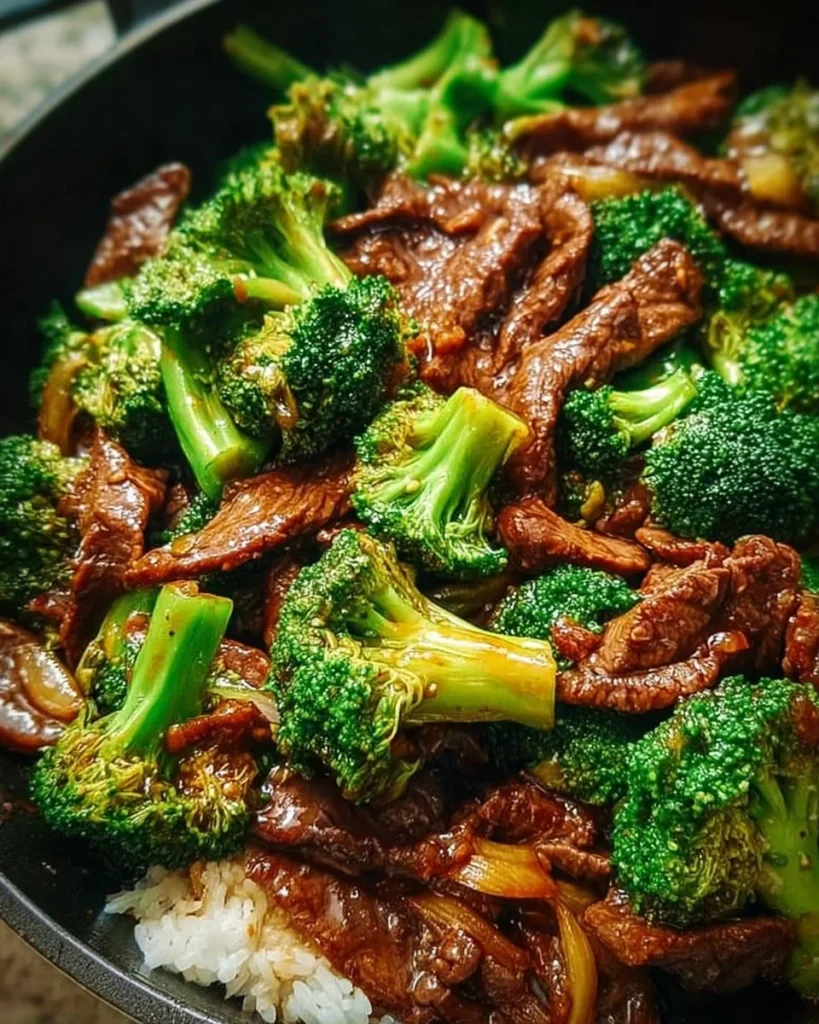 Delicious plate of Chinese Beef and Broccoli served with rice