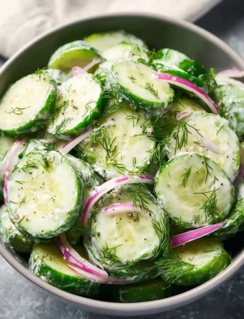Fresh Cucumber Dill Salad served in a bowl with herbs and spices