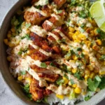 Delicious street corn chicken rice bowls with tender chicken and vibrant flavors