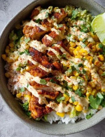 Delicious street corn chicken rice bowls with tender chicken and vibrant flavors