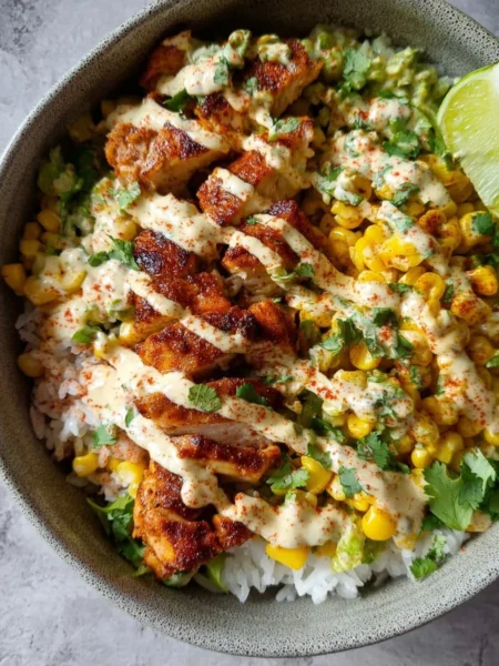 Delicious street corn chicken rice bowls with tender chicken and vibrant flavors
