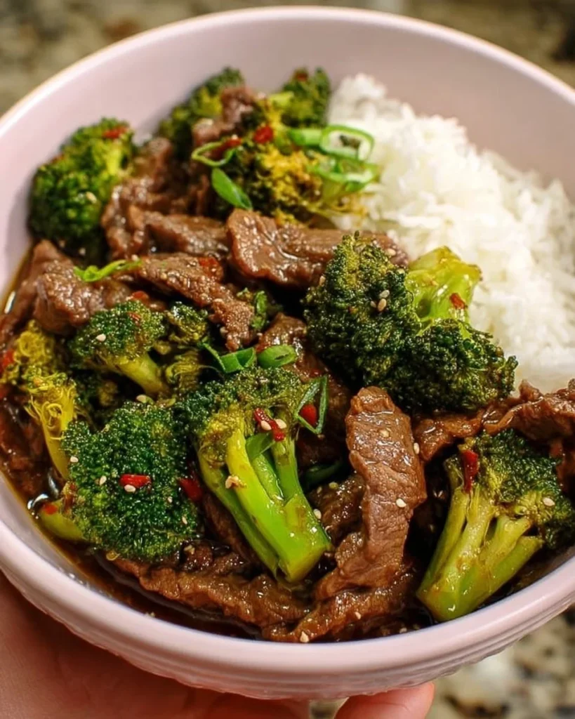 Beef and Broccoli Stir-Fry served in a sizzling pan.