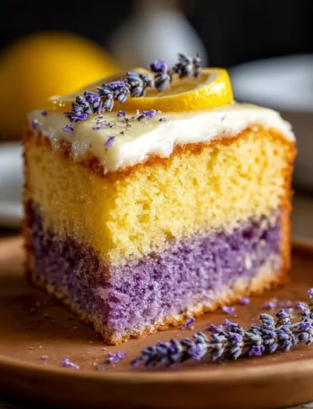 Delicious Lemon Lavender Cake with a garnish of lavender flowers and lemon slices