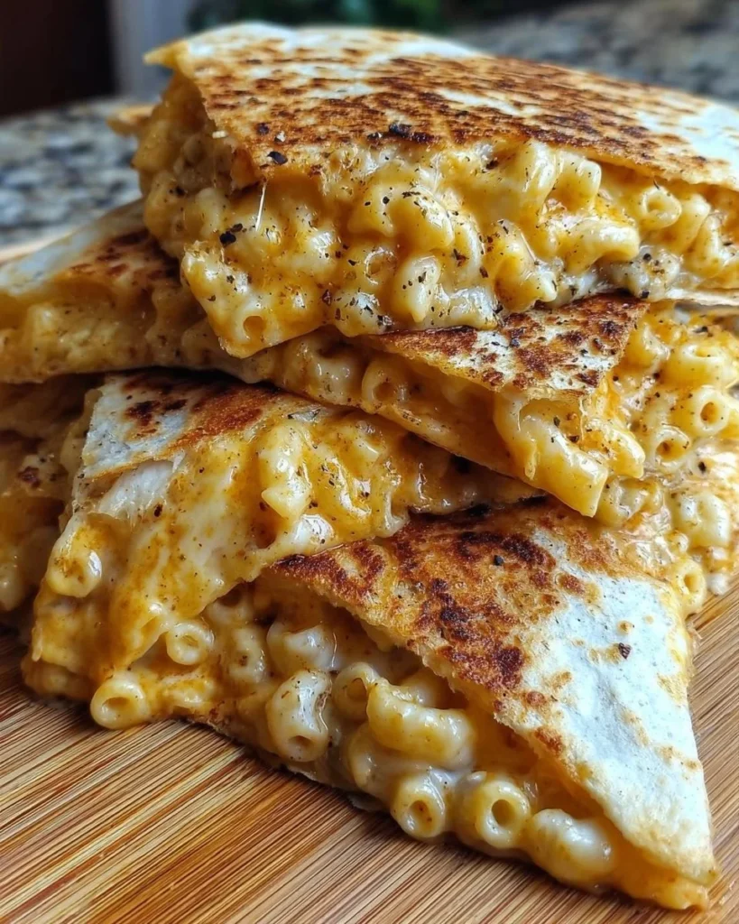 Delicious Mac and Cheese Quesadillas served with dipping sauce
