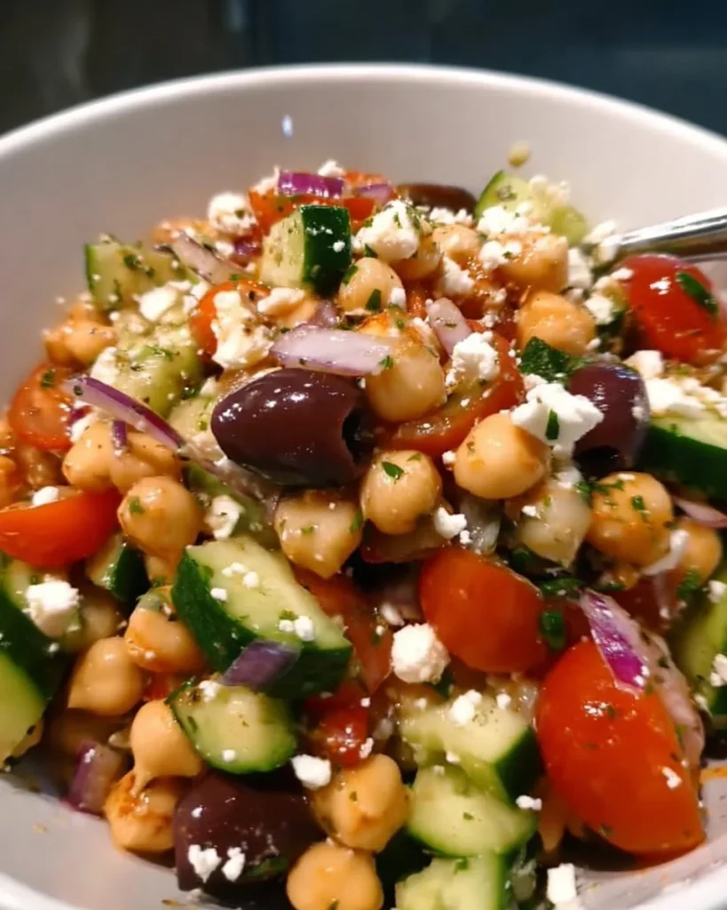 Mediterranean chickpea salad with fresh vegetables and dressing